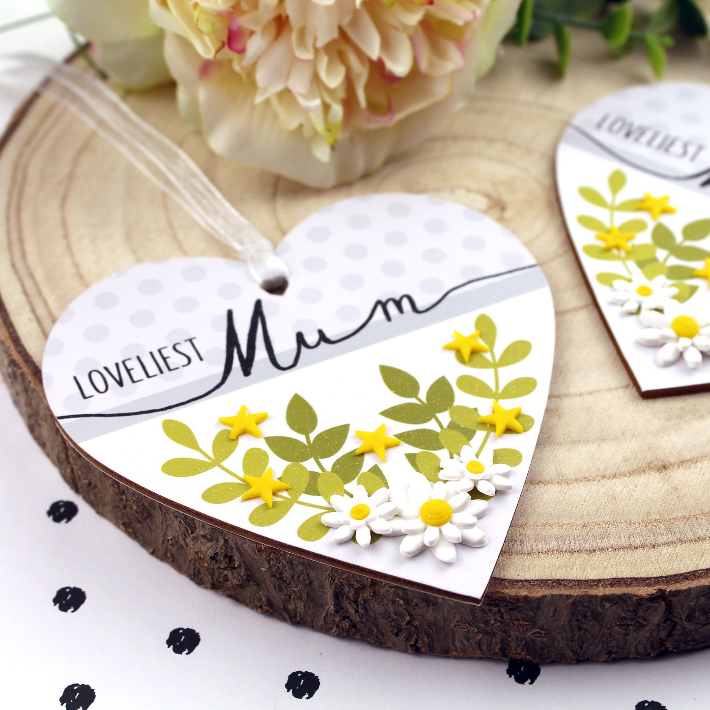 Close up of flowers on Loveliest Mum heart keepsake