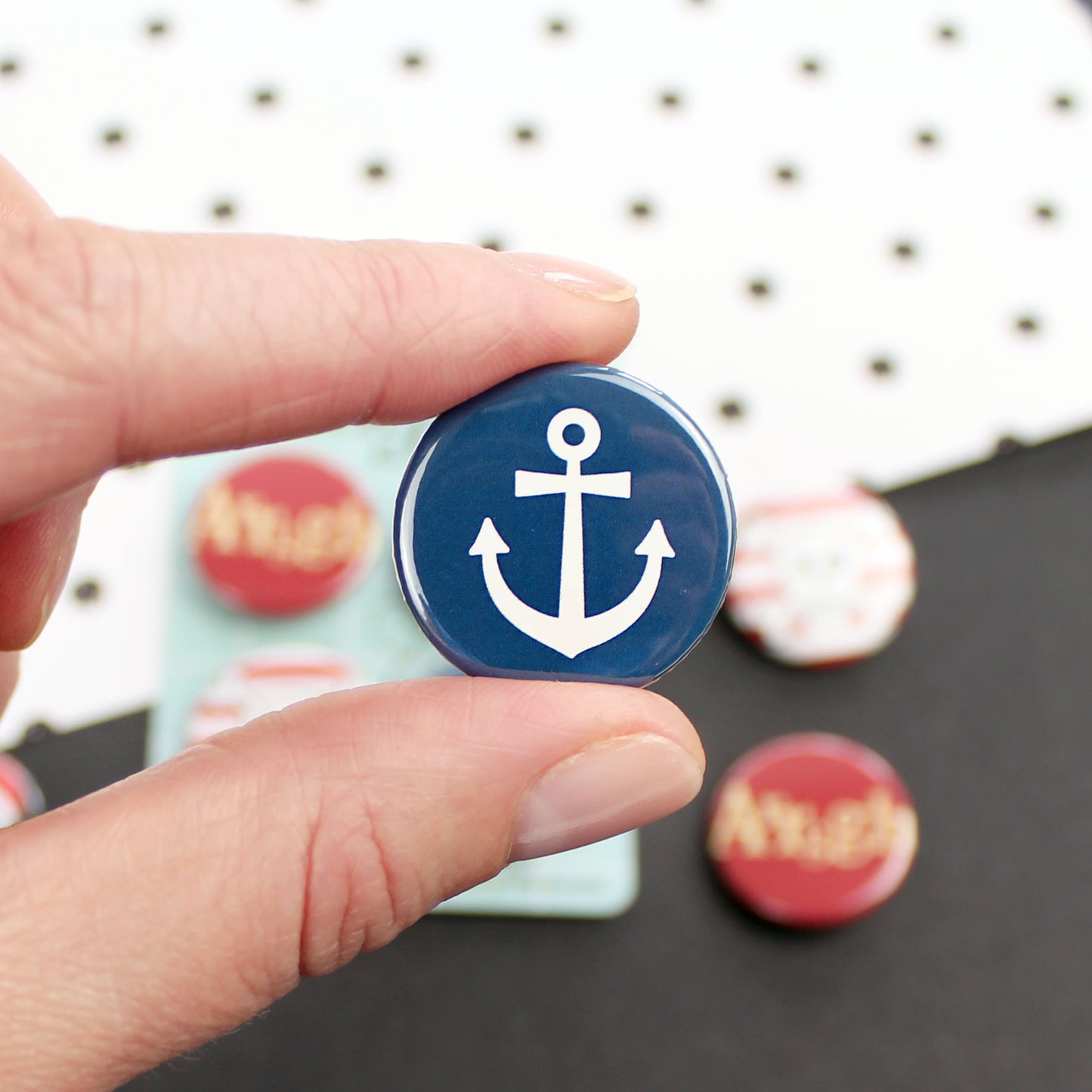 A white anchor on a blue background