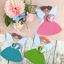 Load image into Gallery viewer, Three fairies with different colour dresses, skin colour and hair colour. Each holding matching badges.