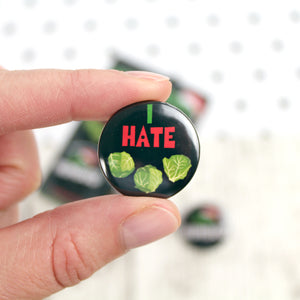 The words ‘I hate’ and three green sprouts