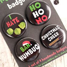 Load image into Gallery viewer, Close up of anti Christmas badges