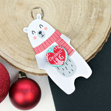 Load image into Gallery viewer, Christmas Hug badge with a polar bear