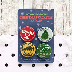 A set of four Christmas Vacation badges