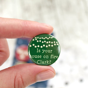 Christmas lights with the words 'Is your house on fire Clark?'
