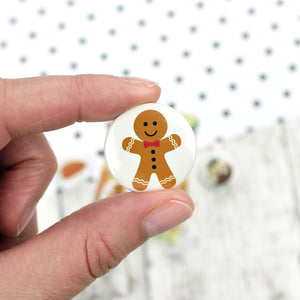 A gingerbread man with icing decorations