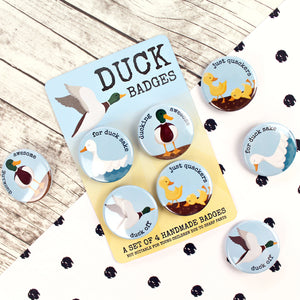 Duck badges with rude word puns