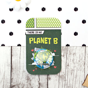 I'm an Eco Superhero badge on a There is no planet B card backing