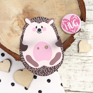 Pink and brown Hedgehog card backing with badge at the side