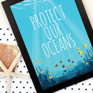 Close up of protect our oceans print with colourful fish