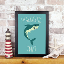 Load image into Gallery viewer, Shark on a blue background with the words sharkastic twat