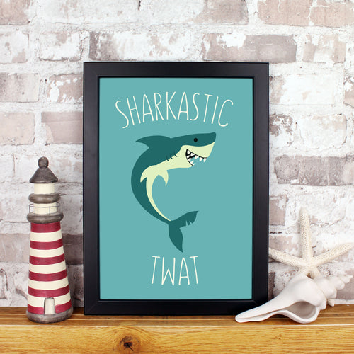 Shark on a blue background with the words sharkastic twat