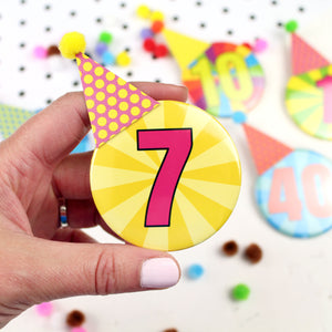 Colourful badge with number on